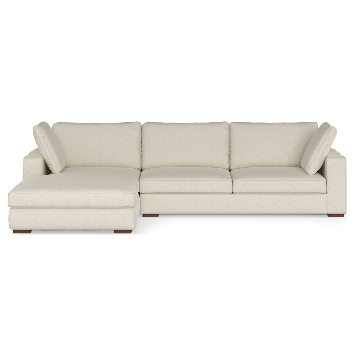 Beige upholstered sectional sofa with left chaise extension and deep seating