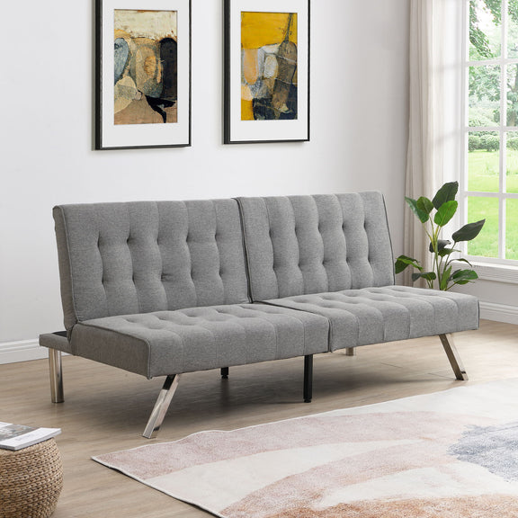 Gray futon sofa bed with button-tufted back and folded mattress seat