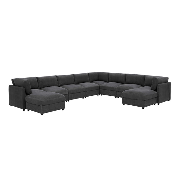 Dark gray sectional sofa with two ottomans in an L-shaped modular corner layout