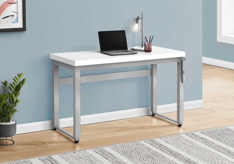 White standing adjustable desk with open shelf frame and height-adjustable legs
