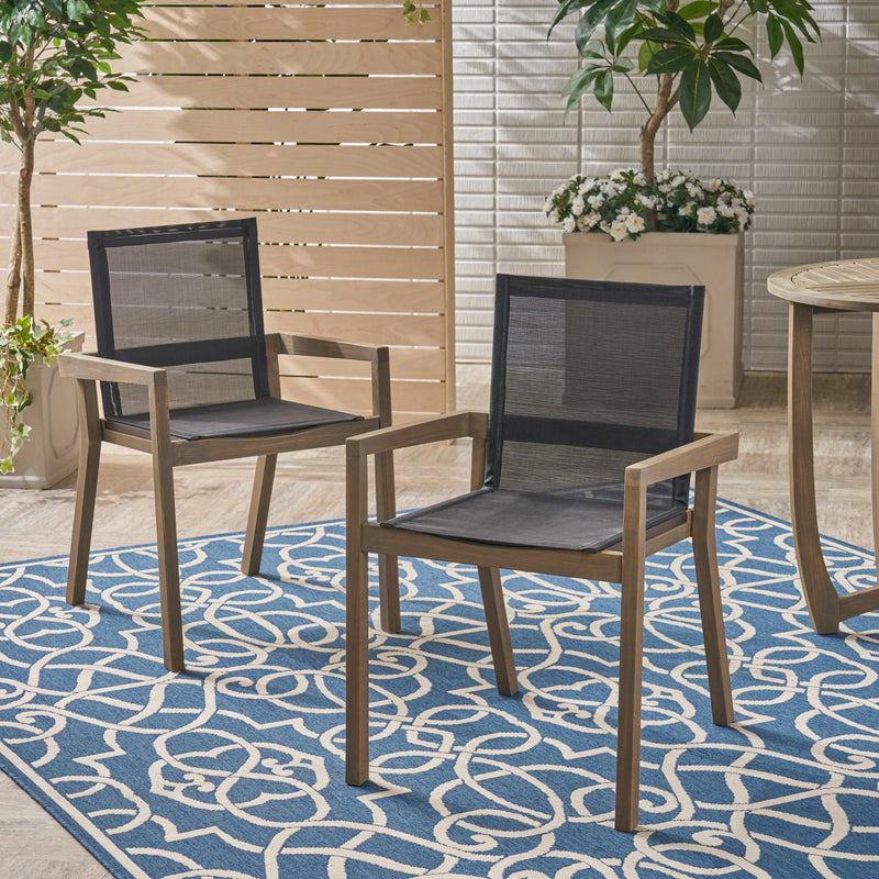 Pair of outdoor dining chairs with gray mesh seats and backs, brown frames, and armrests