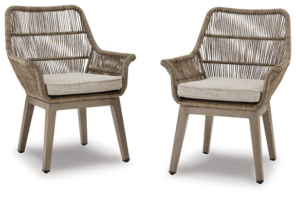 Set of 2 beige woven armchairs with light gray seat cushions, angled view