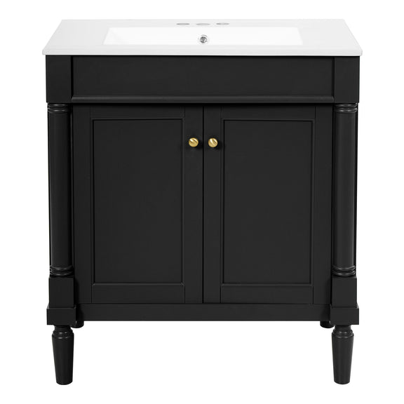 Black bathroom vanity cabinet with sink, two doors, gold knobs, pedestal legs