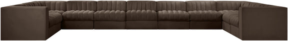 Dark brown modular sectional sofa with tufted backrest and boxy armrests