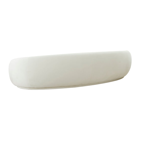 Light beige velvet sofa with rounded arms and back, smooth curved design