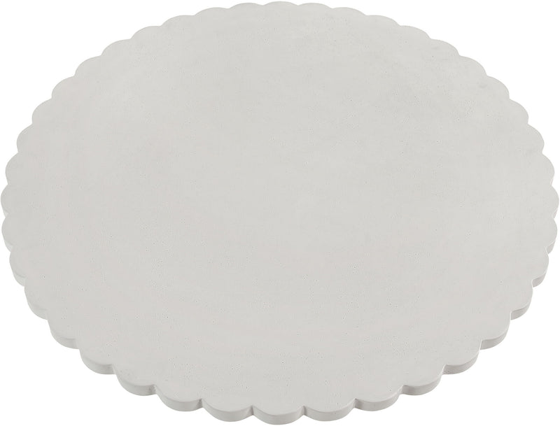 Indoor/outdoor table with round scalloped top and white pedestal base