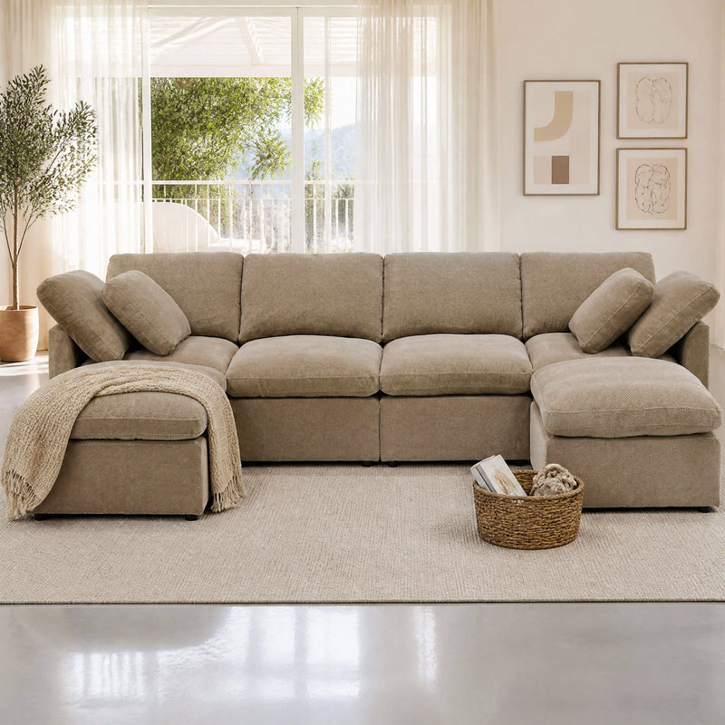 Light brown modular sectional sofa with two chaise ends and accent pillows
