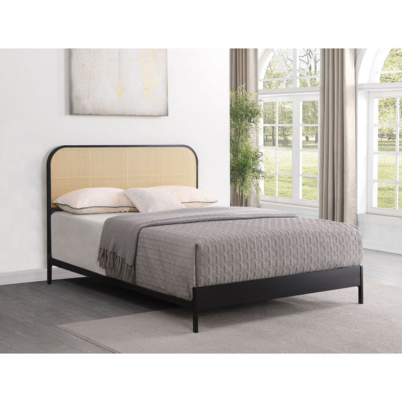Black bed with tan arched headboard, fabric panel, and slatted base.