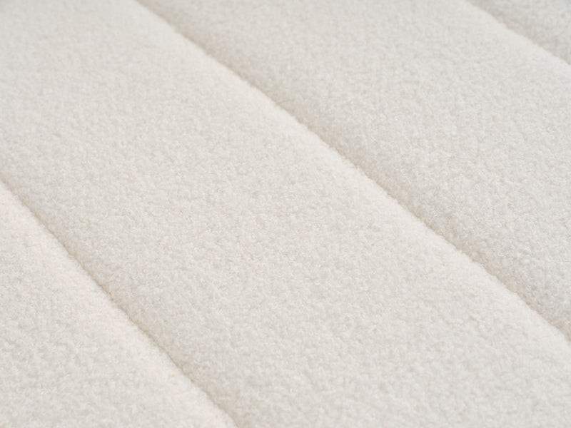 Beige lamb wool upholstery texture close-up