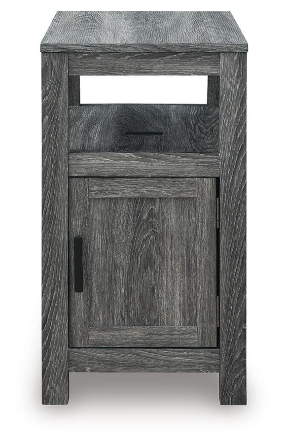 Chair side end table in dark gray wood with open shelf and single cabinet door