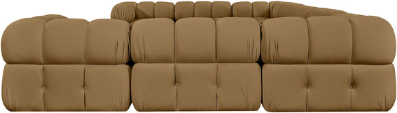 Beige velvet upholstered sectional sofa with tufted backrest and modular seat sections