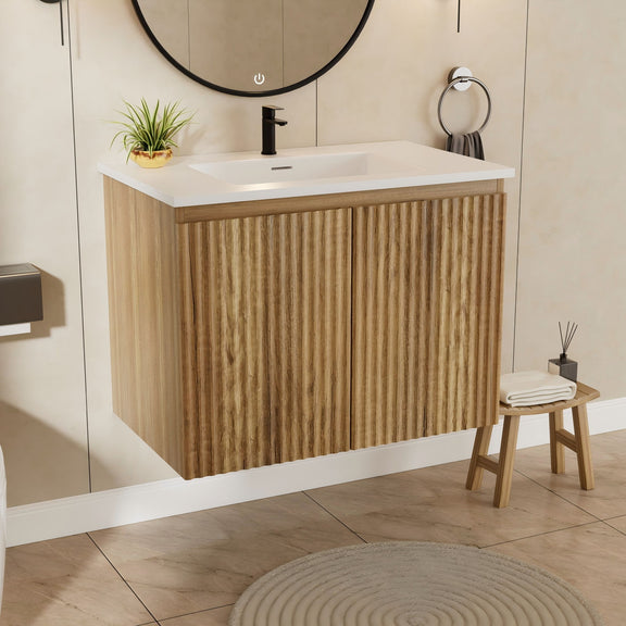 Light wood wall cabinet with ceramic sink, single faucet, and ribbed front panels