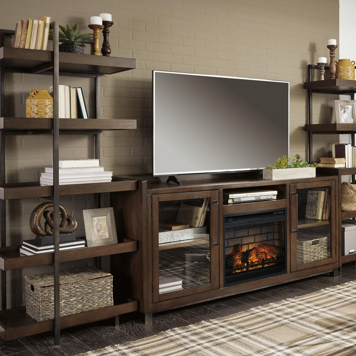 Dark brown TV stand with glass door cabinets, faux fireplace, and open shelving