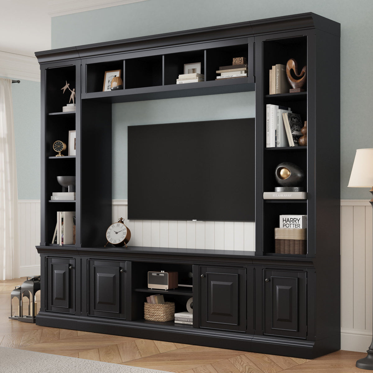 Black entertainment center with hutch, open cubby shelves, and two lower cabinet doors