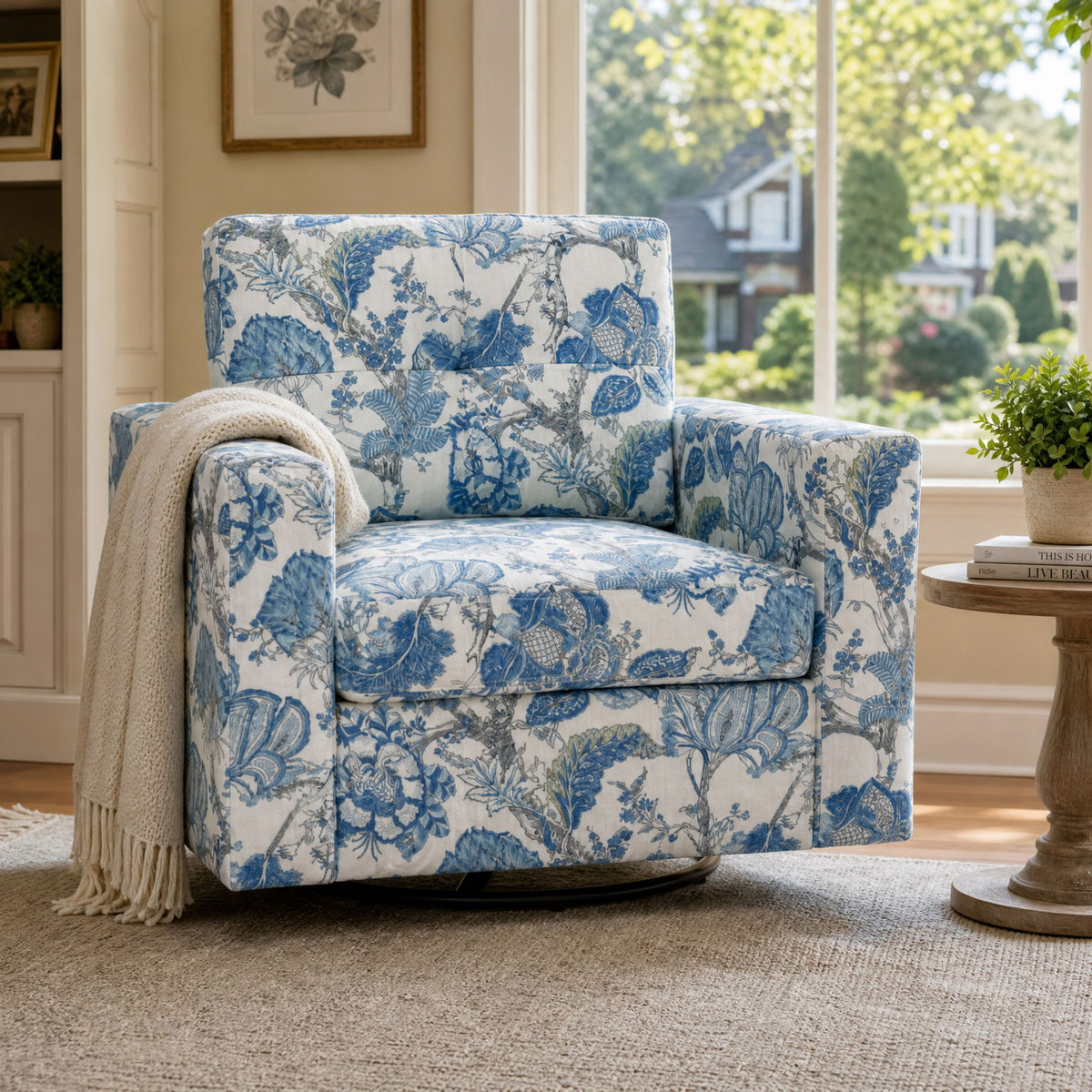 Blue and white floral upholstered single sofa chair with high back and armrests
