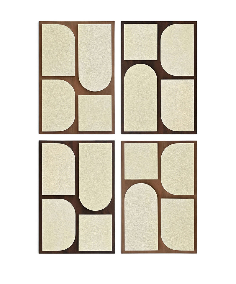 Four-piece wall art set with brown frames and off-white geometric cutout shapes