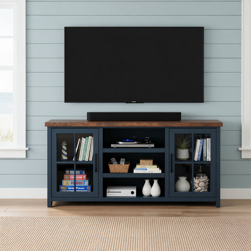 Blue TV stand console with open shelves and glass-door storage, cable management.