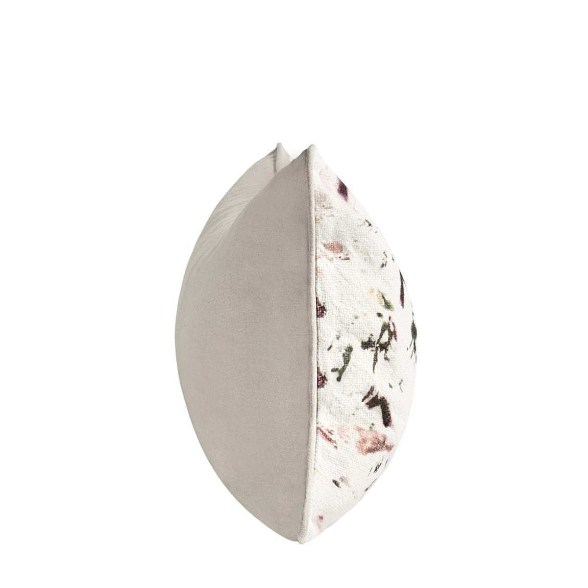 Rectangular lumbar pillow side view with off-white printed fabric and visible seam