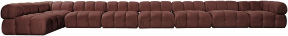 L-shaped velvet sectional sofa in burgundy with tufted seat panels and rolled arms