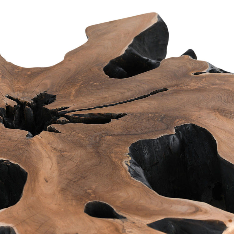 Natural wood coffee table top with dark inlays, carved texture, and root-like grooves