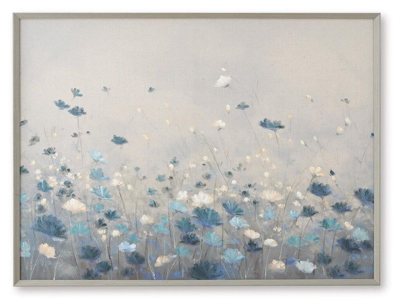 Framed floral wall art with blue and white flowers on a light gray background