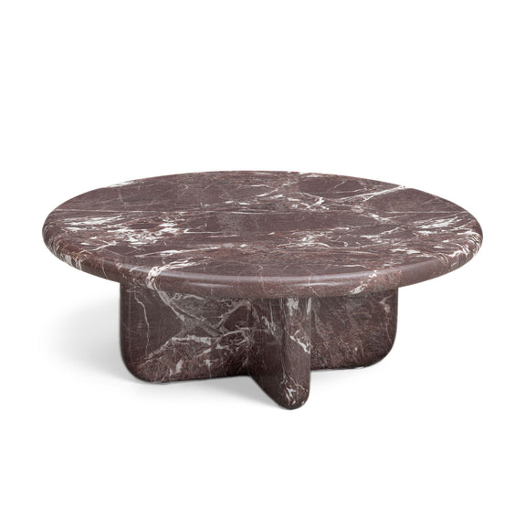 Round dark red marble-look coffee table with white veining and central pedestal
