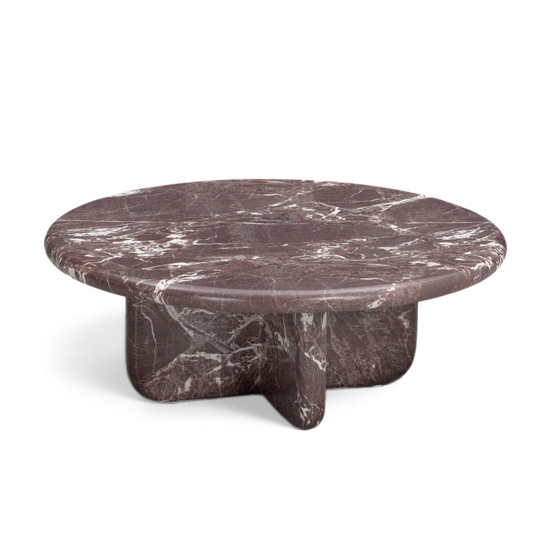 Round dark red marble-look coffee table with white veining and central pedestal