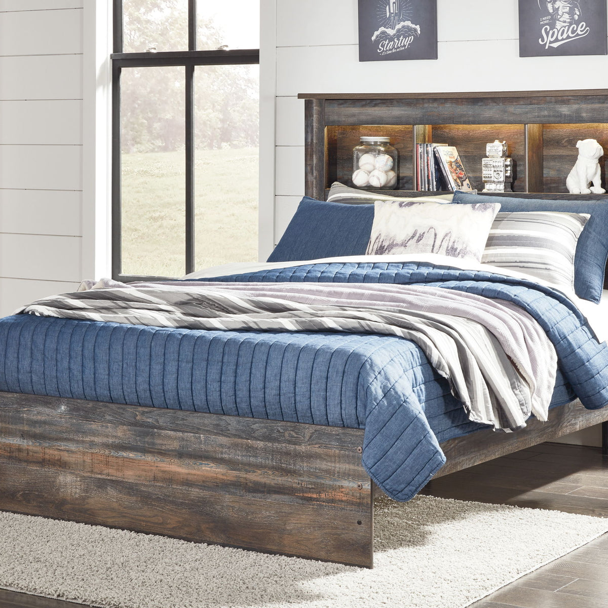 Panel bookcase bed with open-shelf headboard, dark wood frame, blue and white bedding