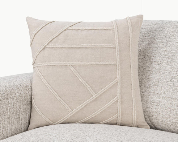 Langdon pillow with natural linen look and contrast-stitched geometric panel on front