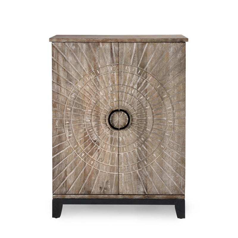 Light brown wood bar cabinet with circular carved door panel and black feet