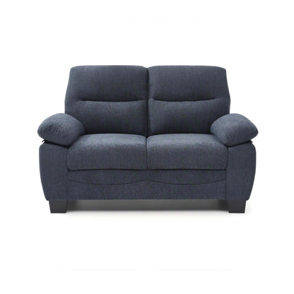 Blue loveseat with pillow-top arms and tufted, removable back cushions