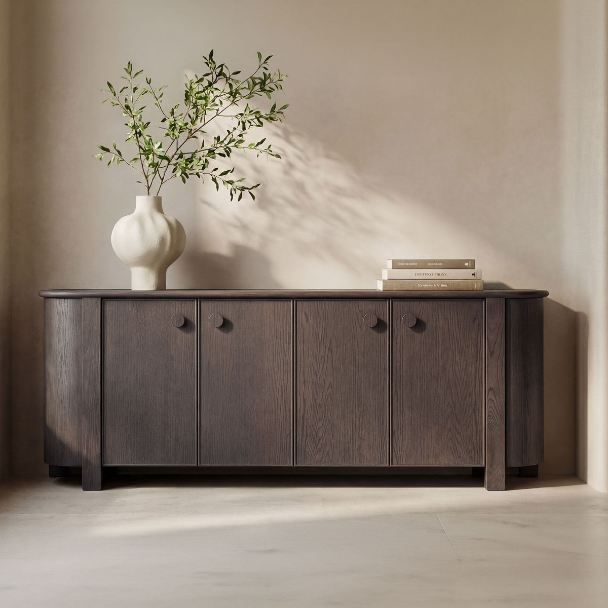 Dark brown sideboard cabinet with four doors, round knobs, and angled corner legs