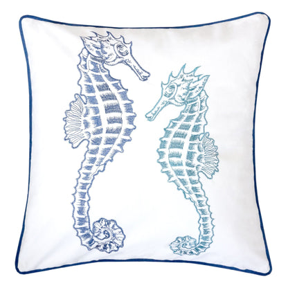 White pillow cover with light blue seahorse embroidery and blue piped edge