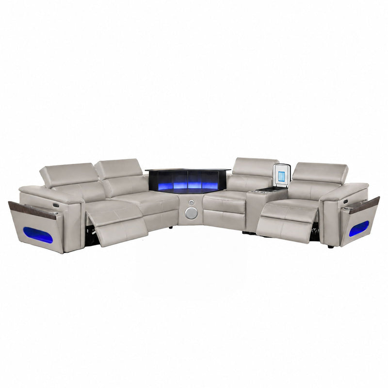Light gray sectional sofa with blue LED back panel and center controls