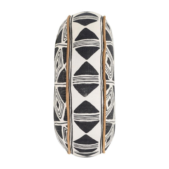 18-inch round pillow side view with black-and-white geometric print and tan fabric piping