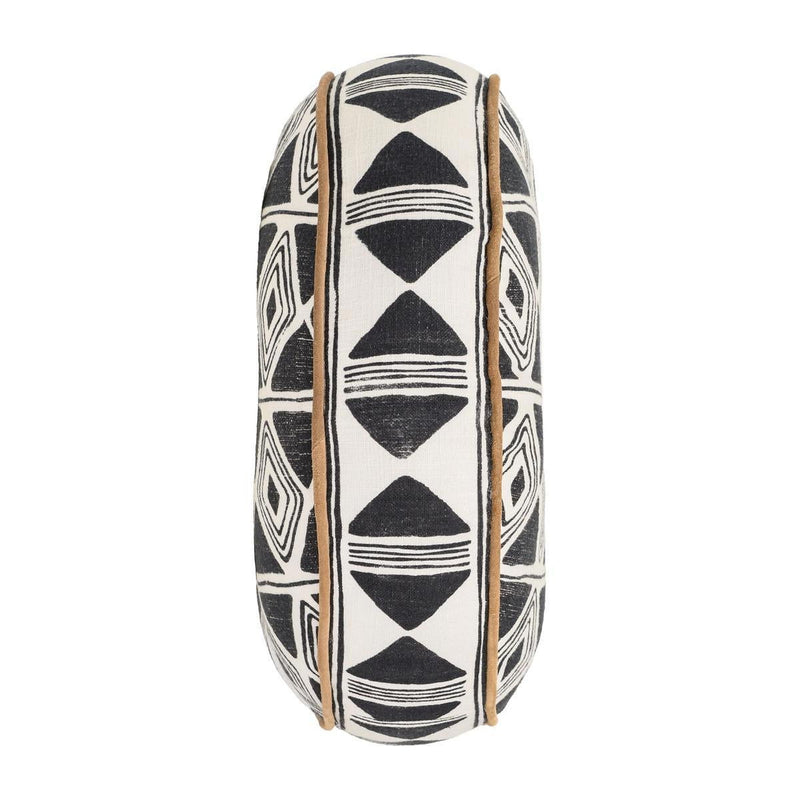 18-inch round pillow side view with black-and-white geometric print and tan fabric piping