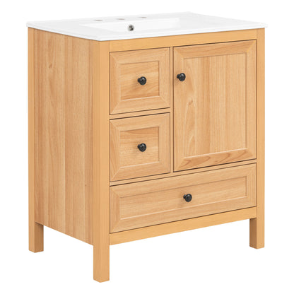 Light brown bathroom vanity with sink top, two cabinet doors, and three drawers