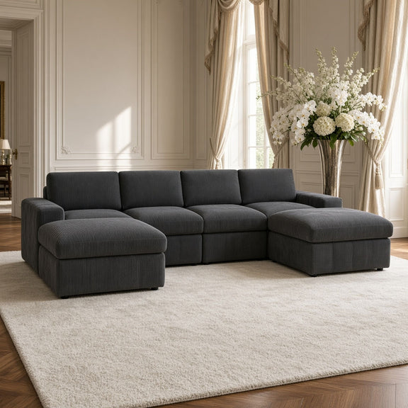 Dark gray modular sectional sofa with two chaise ottomans and tufted back