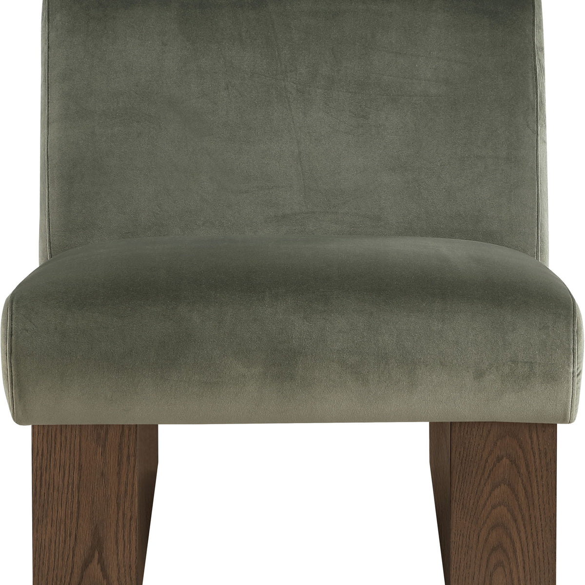 Velvet accent chair with dark green upholstery and walnut-toned wood legs, wide seat.