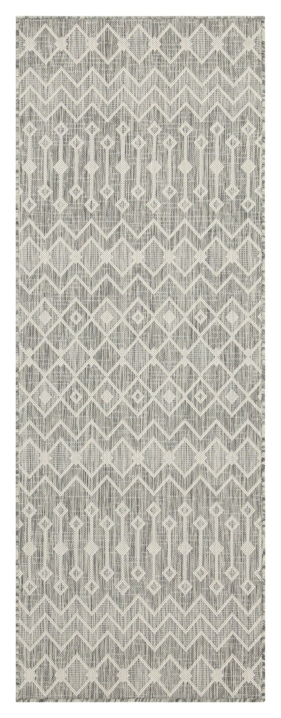 Indoor/outdoor polypropylene area rug, light gray with subtle ivory geometric chevron pattern.