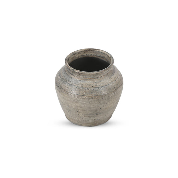 Earthenware clay pot with dark interior and rounded body, speckled finish