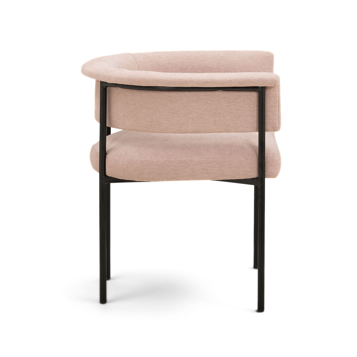 Light pink upholstered dining chair, side view with curved arms and black legs