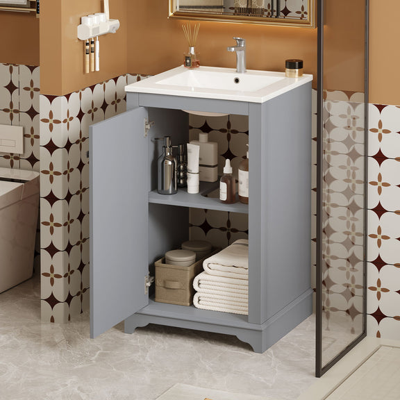 Bathroom vanity with sink, open cabinet door revealing adjustable shelf and storage