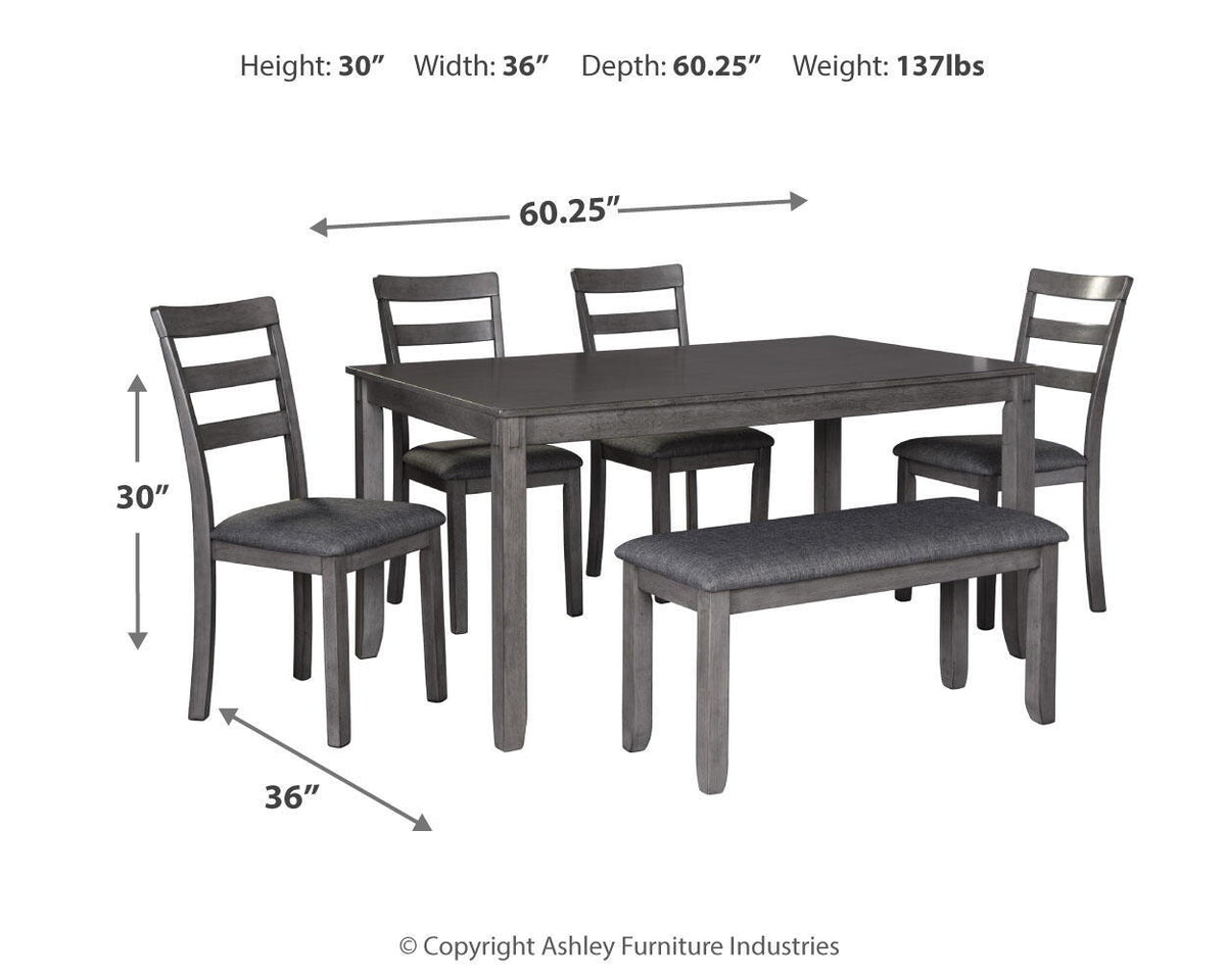 Gray dining table with five upholstered ladder-back chairs, dark wood legs