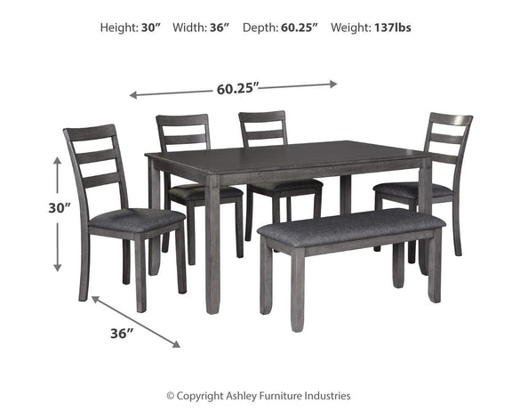 Gray dining table with five upholstered ladder-back chairs, dark wood legs