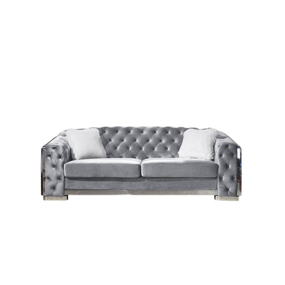 Dark gray 2-seater sofa with button-tufted diamond back, rolled arms, and 2 pillows