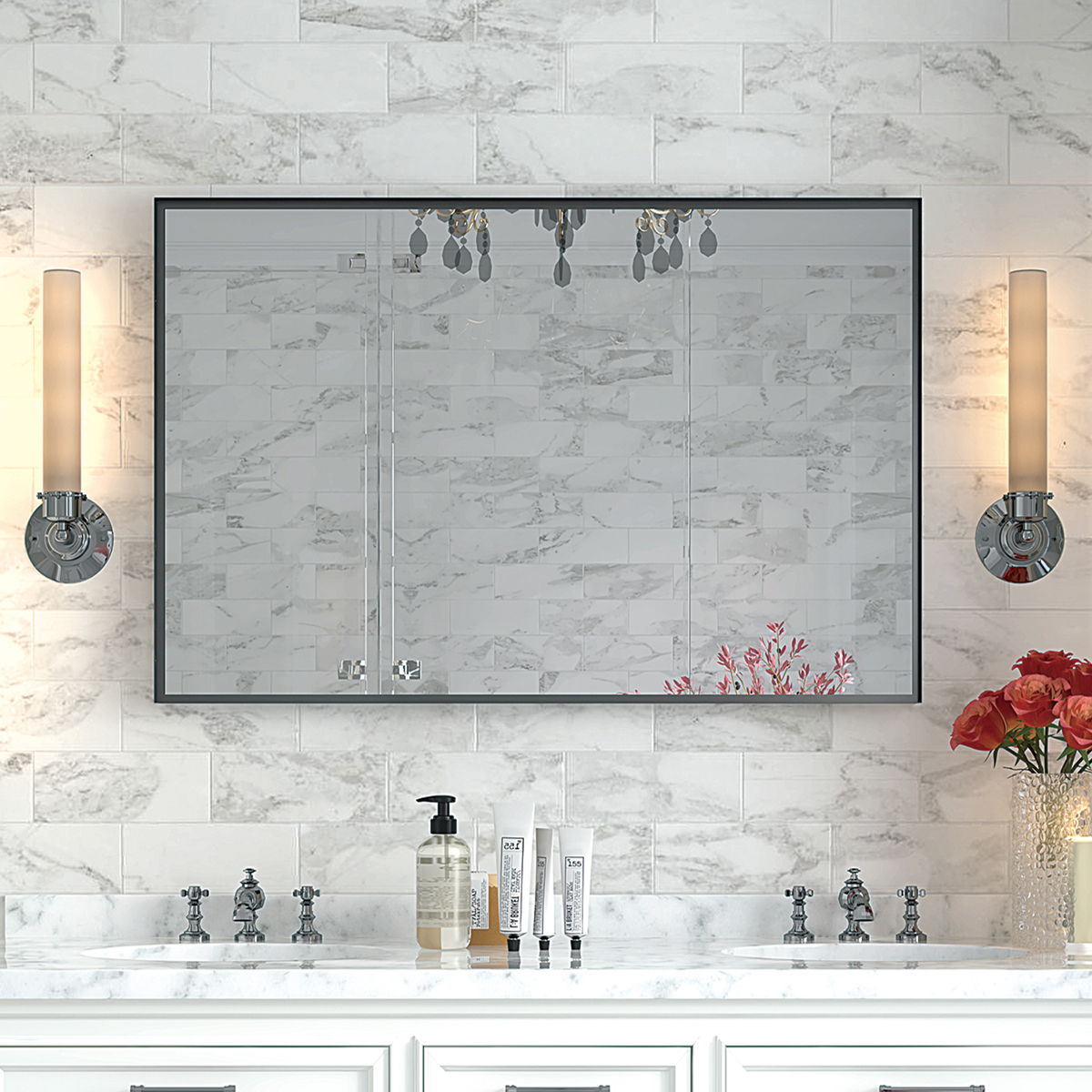 Rectangular bathroom mirror with dark frame against light marble tile wall.