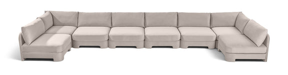 Light gray armless U-shaped sectional sofa with chaise modules and box cushions