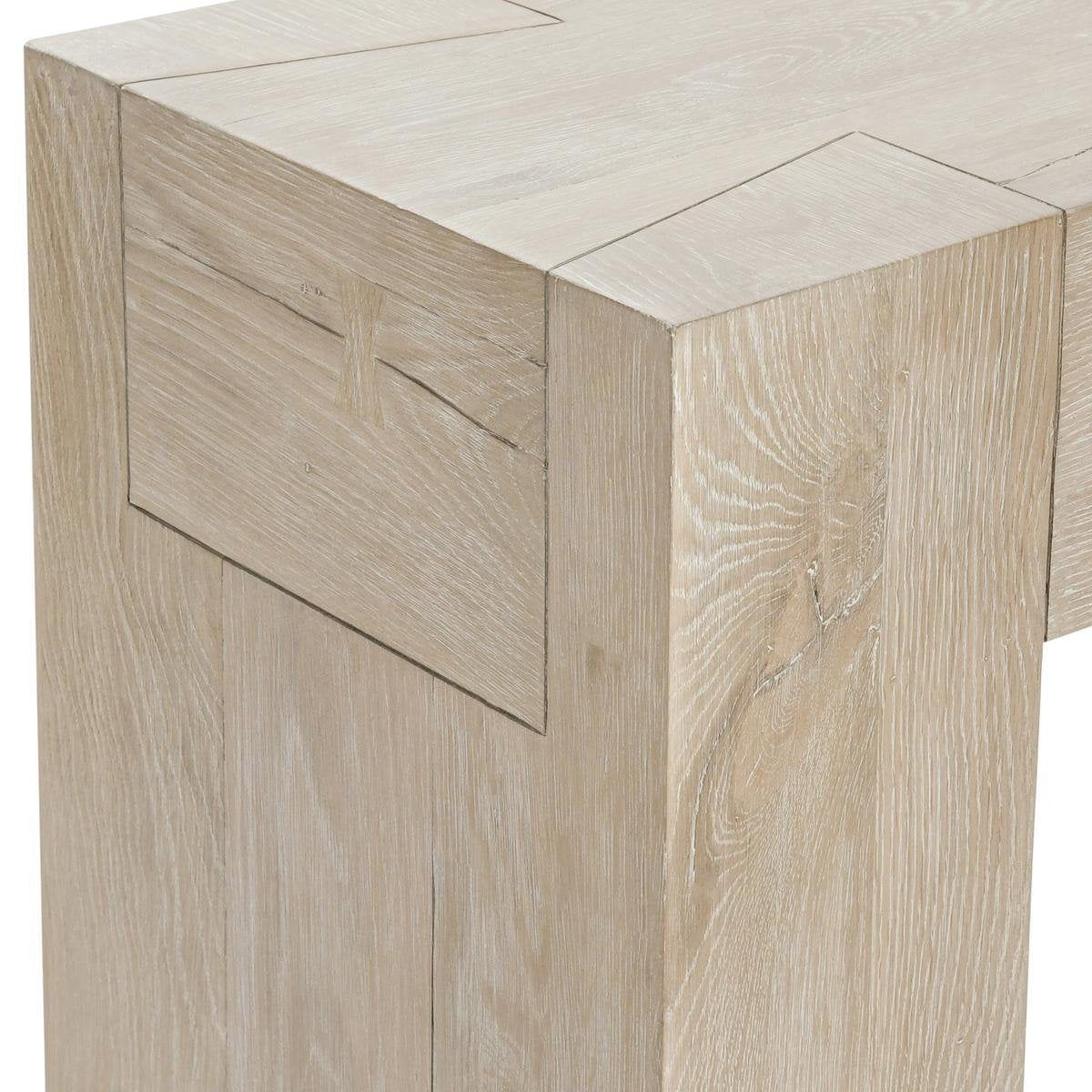 Aged cream reclaimed oak table with drawer front and visible wood grain