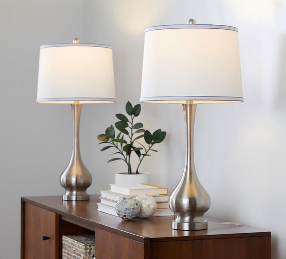Set of 2 table lamps with tall nickel bases and white drum shades, silver trim